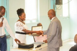 Community members on La Gonave participating in a recognition ceremony celebrating their involvement in Starfysh programs.