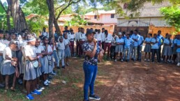 Starfysh Agronomist Natalie preparing students for a school planting project on La Gonave.