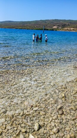 Pastor Charles Eveny baptizing new believers in the Gulf of La Gonave, Haiti.